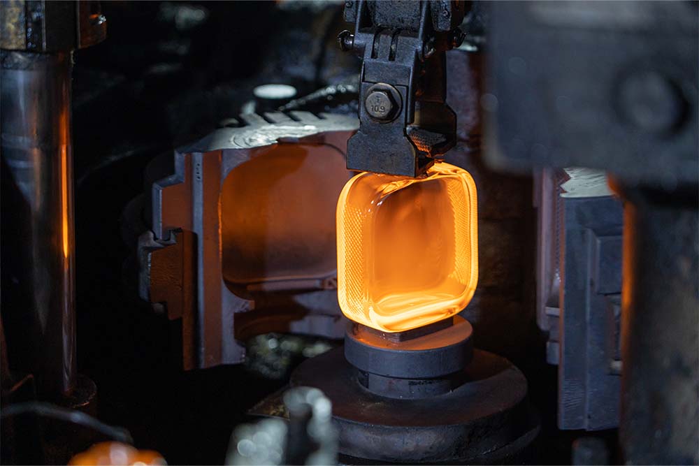 blow forming during glass bottle production 01