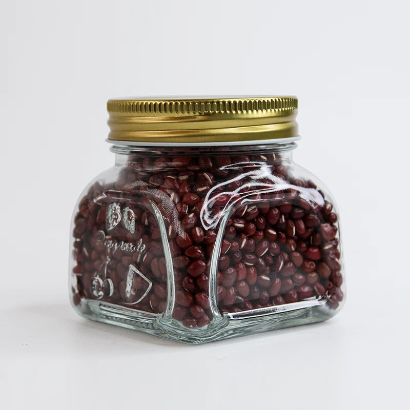 a filled decorative glass jar for food products 01