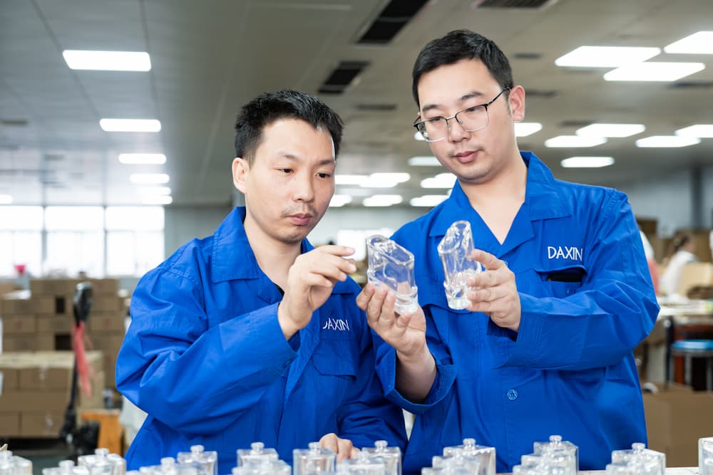 Daxin design team working on glass bottle designs 03