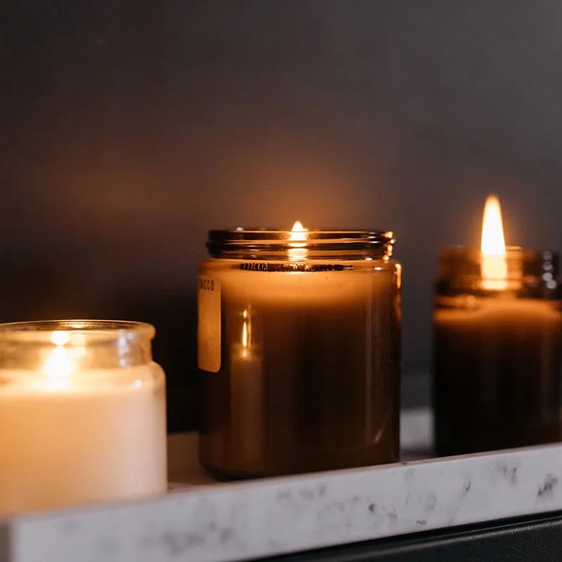 three filled decorative candle packaging with screw on lid 01