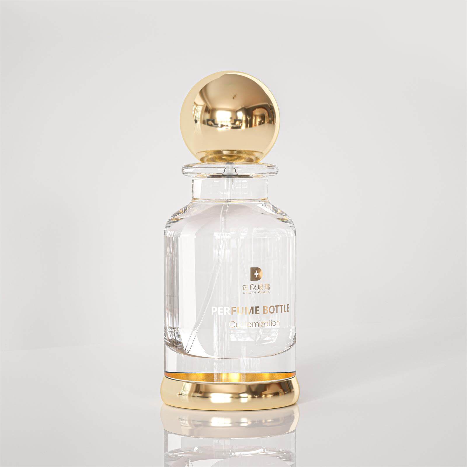 clear perfume bottle with gold cap