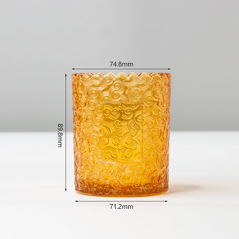 a yellow decorative glass candle jar with custom label 01