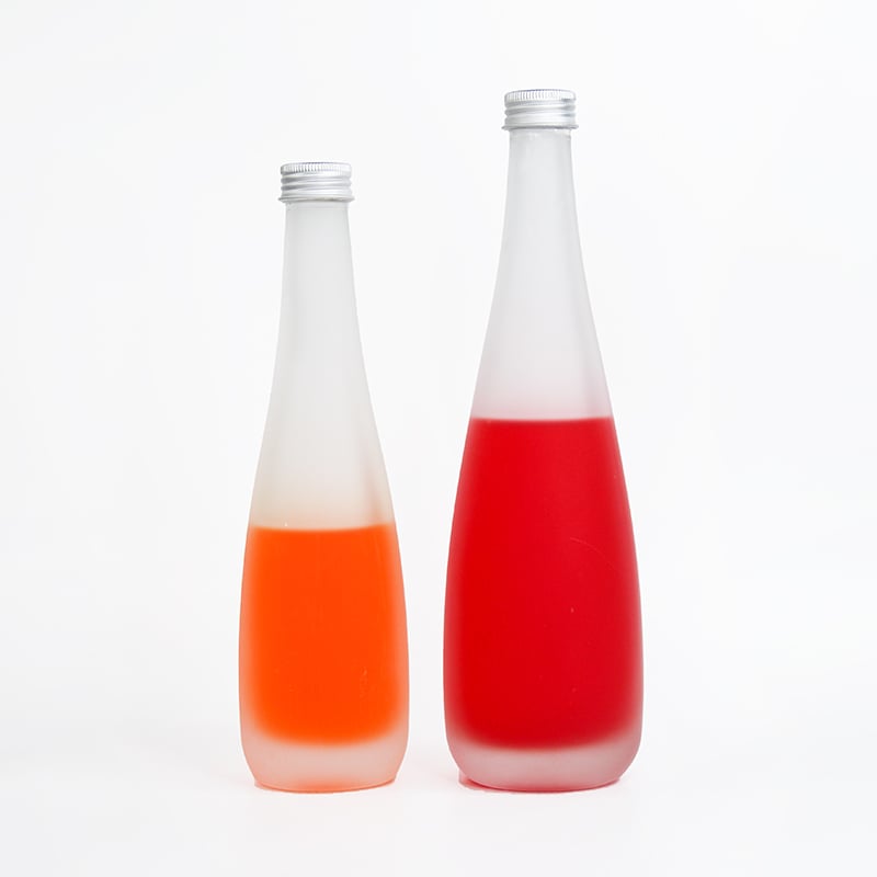 two filled glass bottle packaging for beverages 01