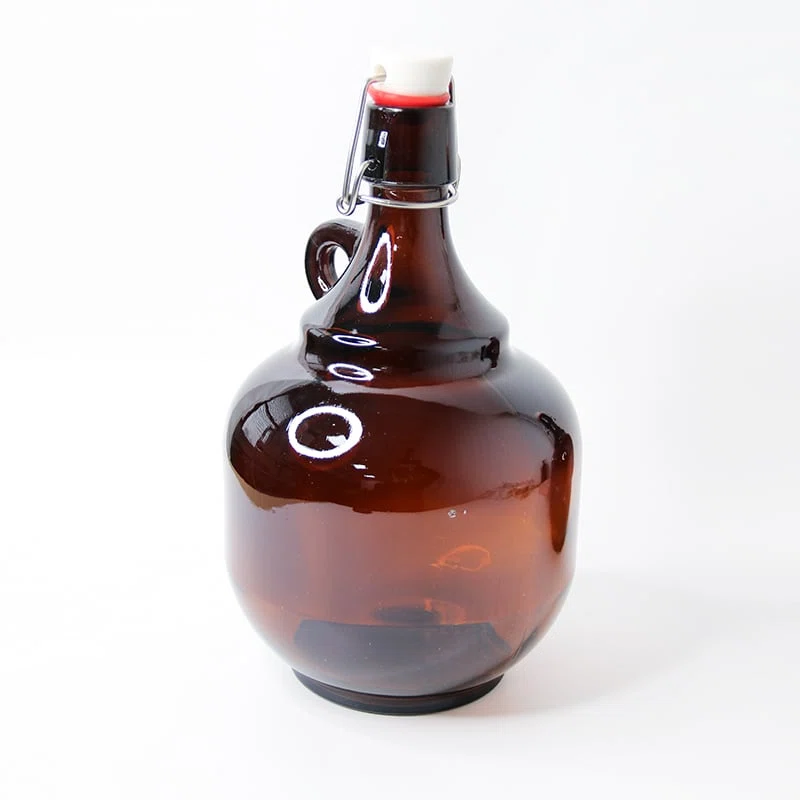 a glass jug packaging for beverages with stopper closure 01