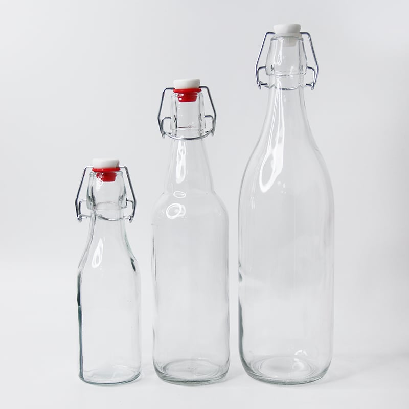 three clear glass packaging for beverages with stopper closure 01