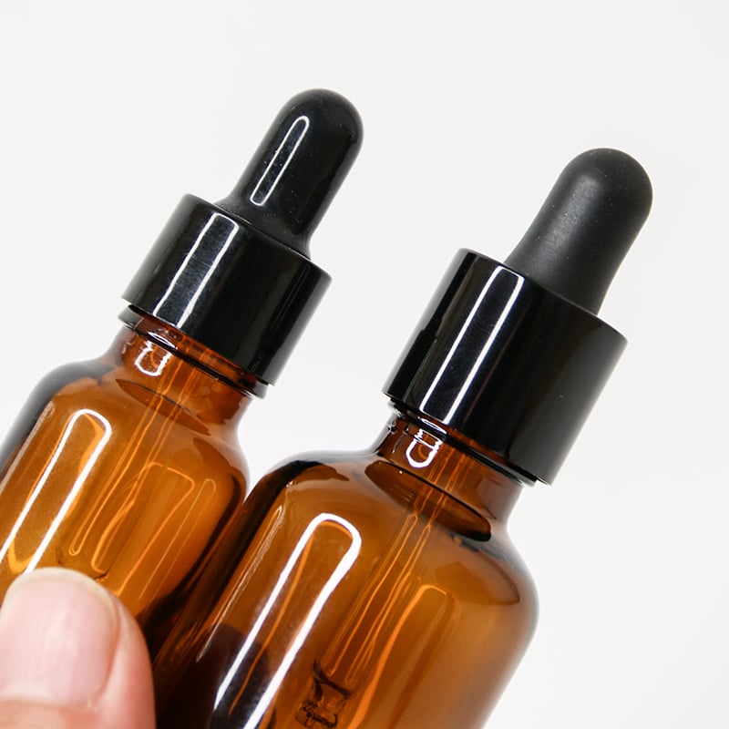 two opaque glass bottle packaging for serums with medicine dropper closure 01