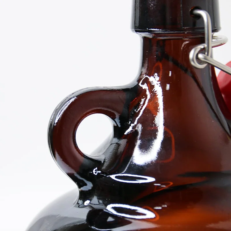 close up of a glass jug packaging for beverages with stopper closure 01